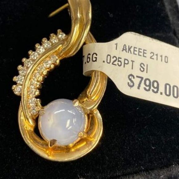 Star sapphire gold diamond accent pendant